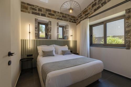 Ένα ή περισσότερα κρεβάτια σε δωμάτιο στο Villa Ioannis - With Private Pool