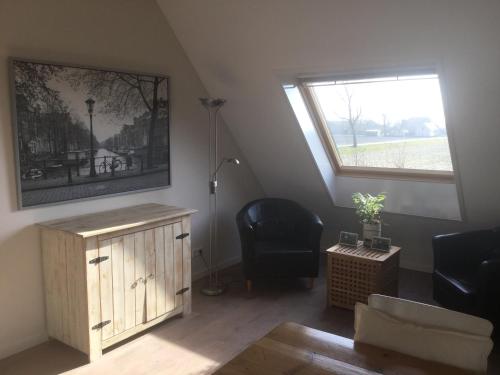 Ruang duduk di Boerderij de Waard