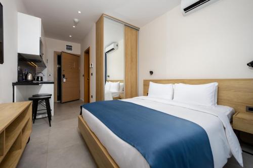 Katil atau katil-katil dalam bilik di Royal Blue Resort & Residences