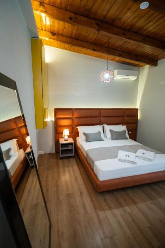 Eden hotel tesisinde bir odada yatak veya yataklar