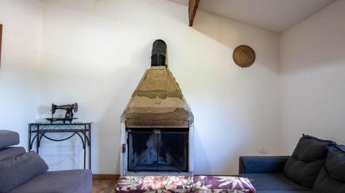 Ruang duduk di Refugio Pet-Friendly c Lareira, garagem e Wi-fi