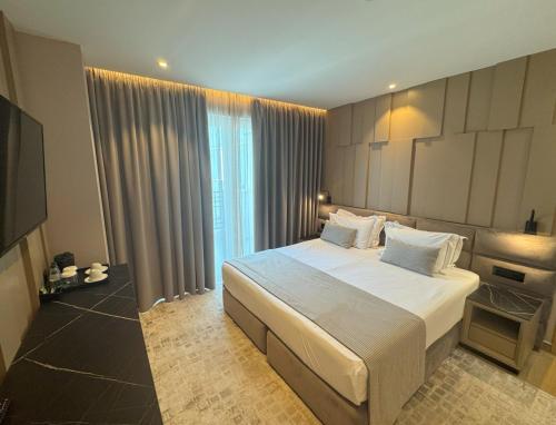 Postel nebo postele na pokoji v ubytování Bonita Classic Hotel & Spa