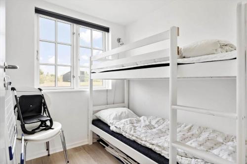 Ένα ή περισσότερα κρεβάτια σε δωμάτιο στο 3331-Hvide-Sande-Anker-Eskildsens-Vej-3-I