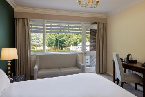 Katil atau katil-katil dalam bilik di New Bath Hotel & Spa