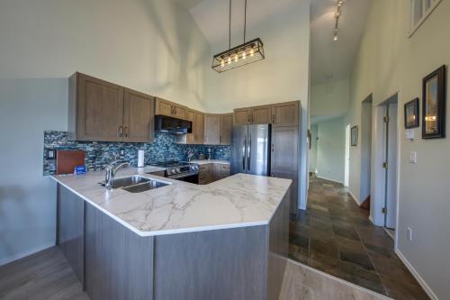 a kitchen with a sink and a counter at Marble Canyon in Fairmont Hot Springs