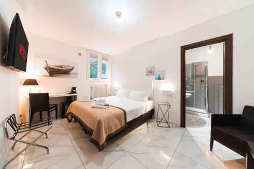 Ένα ή περισσότερα κρεβάτια σε δωμάτιο στο Grand Central Room