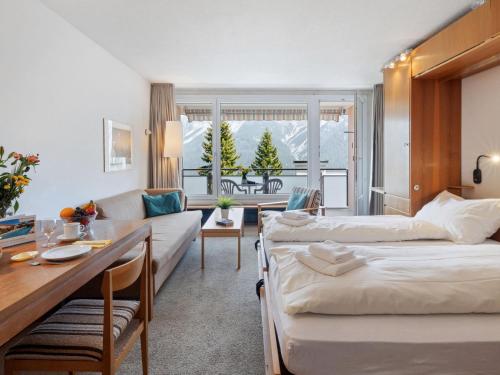 Ένα ή περισσότερα κρεβάτια σε δωμάτιο στο Apartment Promenade - Utoring-28 by Interhome