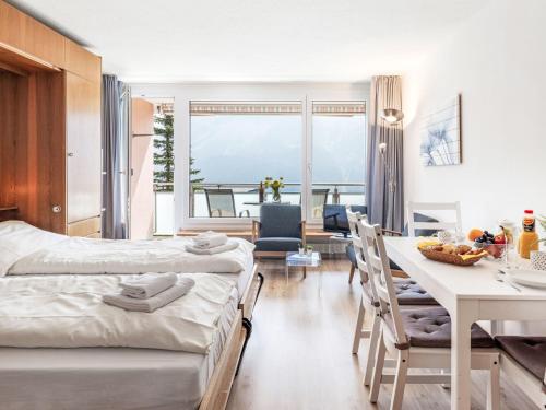 Giường trong phòng chung tại Apartment Promenade - Utoring-72 by Interhome