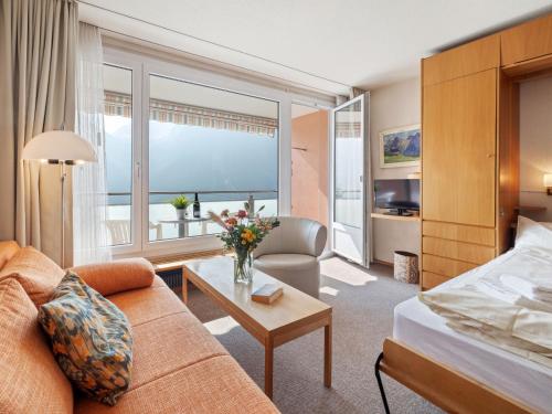 Giường trong phòng chung tại Apartment Promenade - Utoring-69 by Interhome