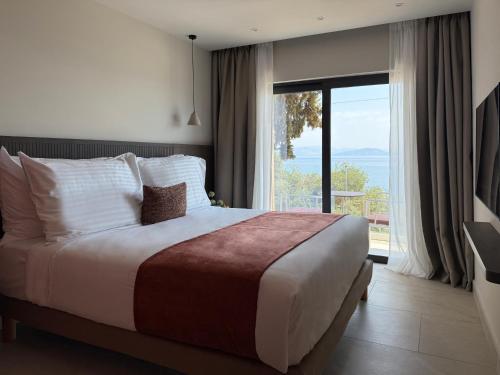 Posteľ alebo postele v izbe v ubytovaní Valmar Corfu