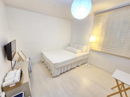 Cama o camas de una habitación en Blau Guesthouse