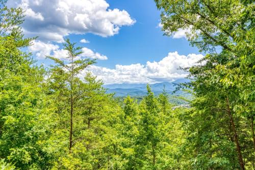 a view of the mountains through the trees at Heavenly Gaze in Pigeon Forge