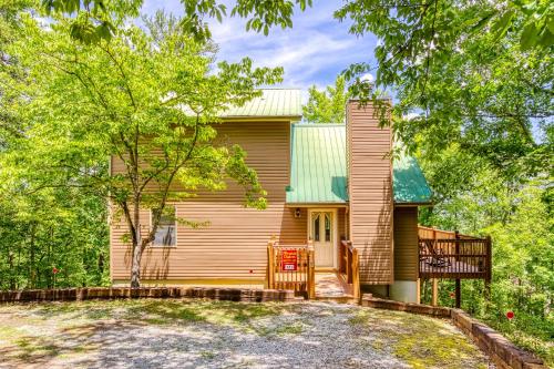 a house with a porch and a deck at Heavenly Gaze in Pigeon Forge