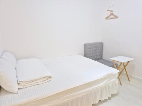 Cama o camas de una habitación en Blau Guesthouse