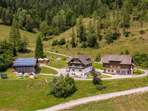 an aerial view of a house on a hill at Apartment Ferienglück by Interhome in Arriach