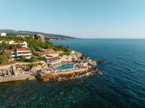 an aerial view of a resort in the ocean at Radisson Resort Ruza Vjetrova in Dobra Voda