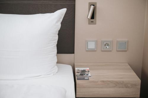 Katil atau katil-katil dalam bilik di Feringapark Hotel by Coffee Fellows Hotels