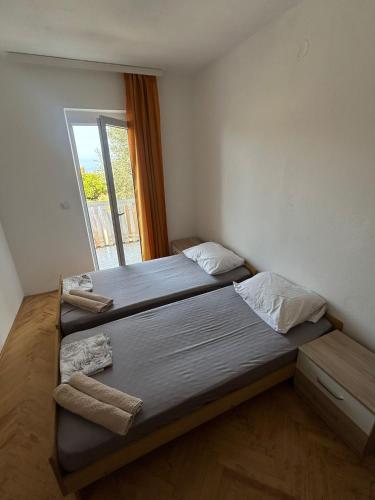 Llit o llits en una habitació de Oliva apartment