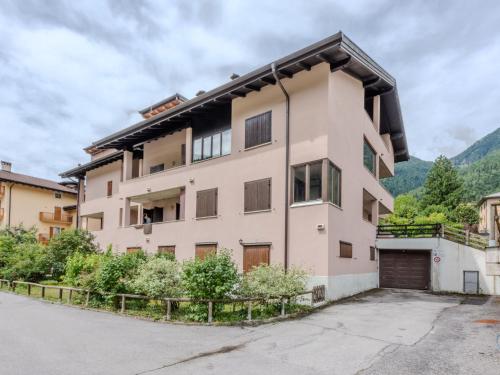 an apartment building in the mountains at Apartment La Casa dei Frassini by Interhome in Strembo