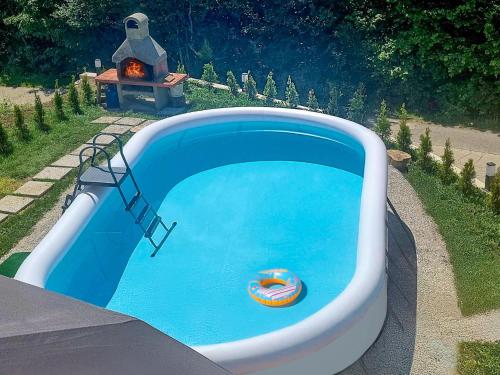 Bazén v ubytování Holiday Home Cosy Home D&D by Interhome nebo v jeho okolí