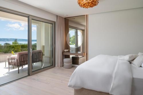 Ένα ή περισσότερα κρεβάτια σε δωμάτιο στο New! Villa A 56, 98m2 heated pool&spa, near Split