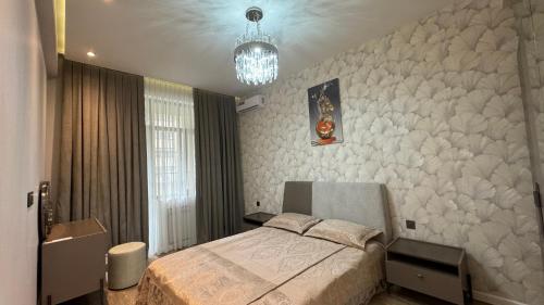 Ένα ή περισσότερα κρεβάτια σε δωμάτιο στο Renessans Palace Apartment