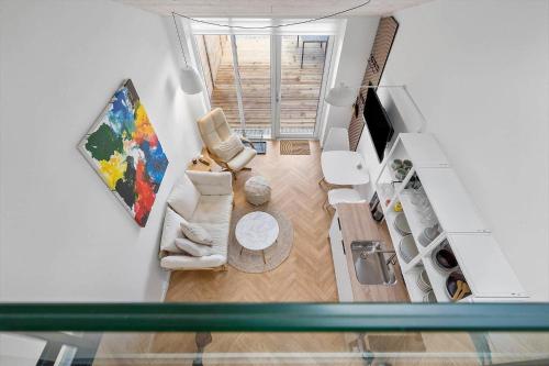 an aerial view of a living room with a couch at 781-Hvide-Sande-Norregade-2-nr-9 in Hvide Sande