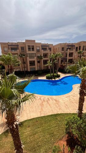 Bassein majutusasutuses Vue piscine et accès rapide à la plage või selle lähedal