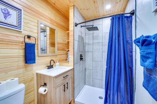 a bathroom with a shower sink and a toilet at Near Table Rock Lake Family Home with Deck and Views in Golden
