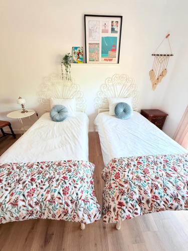 Katil atau katil-katil dalam bilik di Moradia Surf 4 Quartos com escada e Jardim