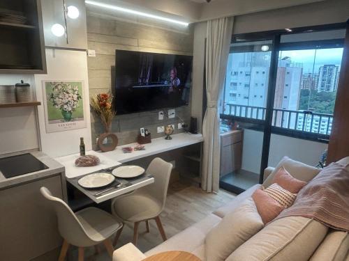 TV a/nebo společenská místnost v ubytování Esplêndido studio ao lado do Allianz Park