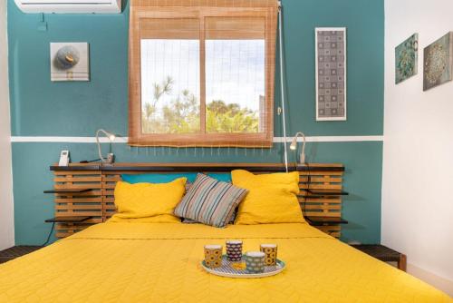 Postel nebo postele na pokoji v ubytování Villa 3 ch l'artist piscine privée et accès plage