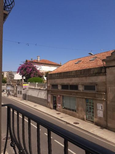 an old building on the side of a street at Hotel GBC Celta in A Guarda