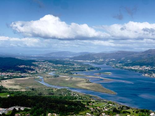 an aerial view of a river and a city at Hotel GBC Celta in A Guarda