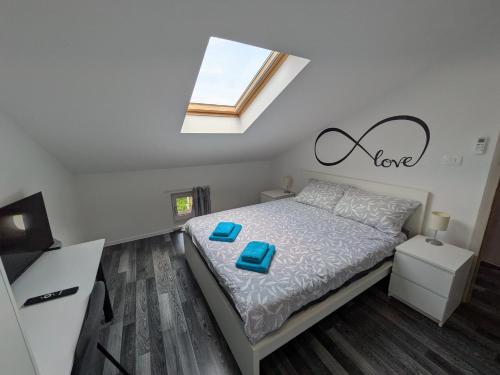 Ένα ή περισσότερα κρεβάτια σε δωμάτιο στο Apartment Juliet