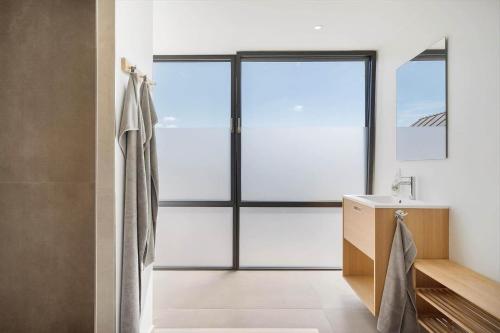 a bathroom with a shower and a sink at 1173-Ringkobing-Jagtvej-34-C-lejl-4 in Ringkøbing