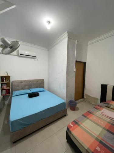Ένα ή περισσότερα κρεβάτια σε δωμάτιο στο Z&Z Budget Room