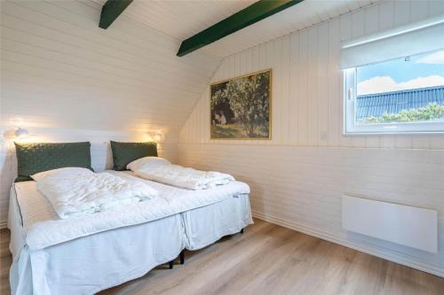 Un pat sau paturi într-o cameră la 147-Ringkobing-Hjelmevej-56