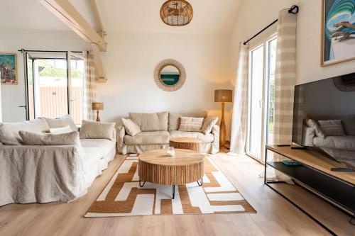 Гостиная зона в Villa Ravel à Capbreton, piscine et détente