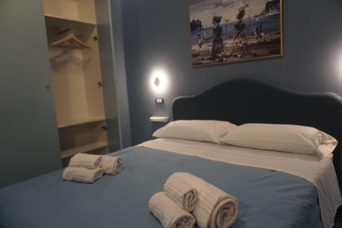 Ένα ή περισσότερα κρεβάτια σε δωμάτιο στο Paradise Luxury Apartments