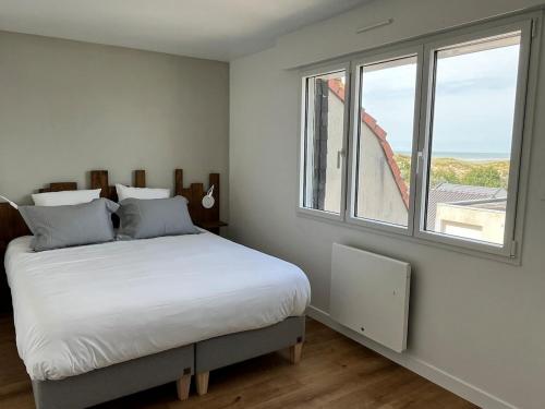 Postel nebo postele na pokoji v ubytování Appartement chic et lumineux - 100 m de la plage
