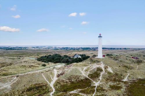 an aerial view of a lighthouse on a hill at 315-Hvide-Sande-Holmsland-Klitvej-115-vest in Hvide Sande