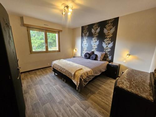 Ένα ή περισσότερα κρεβάτια σε δωμάτιο στο Villa Bellevue - Chez Oma