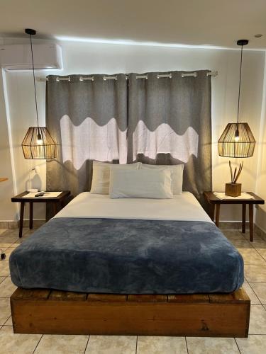 Katil atau katil-katil dalam bilik di Cinco Hotel B&B