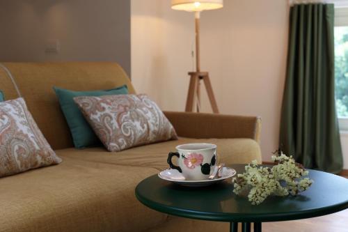 Ruang duduk di Nine Rooms Apartment