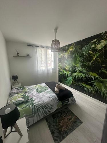 Katil atau katil-katil dalam bilik di La saveur Tropicale-Proche centre ville-Aéroport
