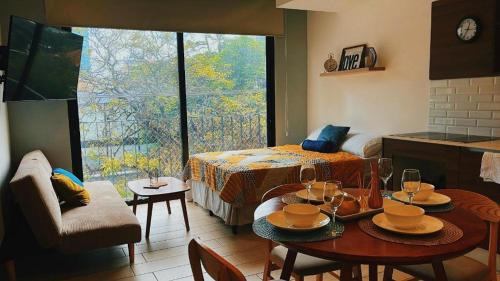 Khu vực ghế ngồi tại Eon 1 - Lujoso apartamento - Zona 10 de la Ciudad de Guatemala