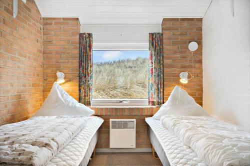 Postel nebo postele na pokoji v ubytování 4474-Hvide-Sande-Mettes-Bjerg-30