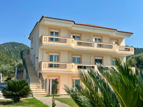 a building with balconies and stairs on it at Agali Studios 2 in Gialtra