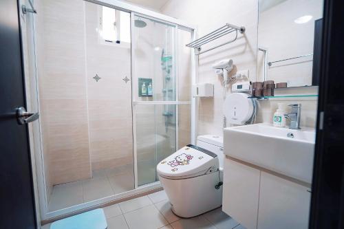 Un baño de 夏之戀民宿 可包棟 近金城市區